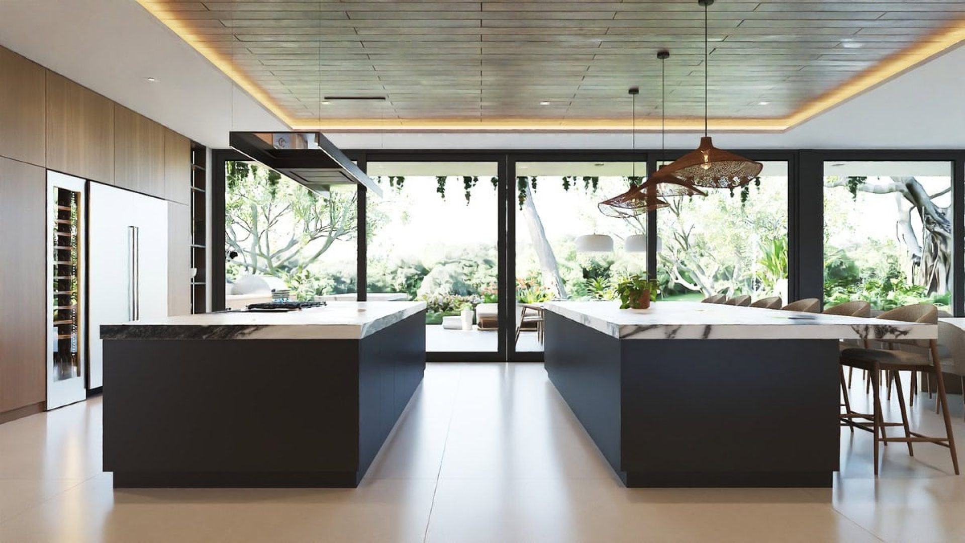Modern kitchen with black island countertops and large windows showcasing lush greenery, creating a bright and airy space.