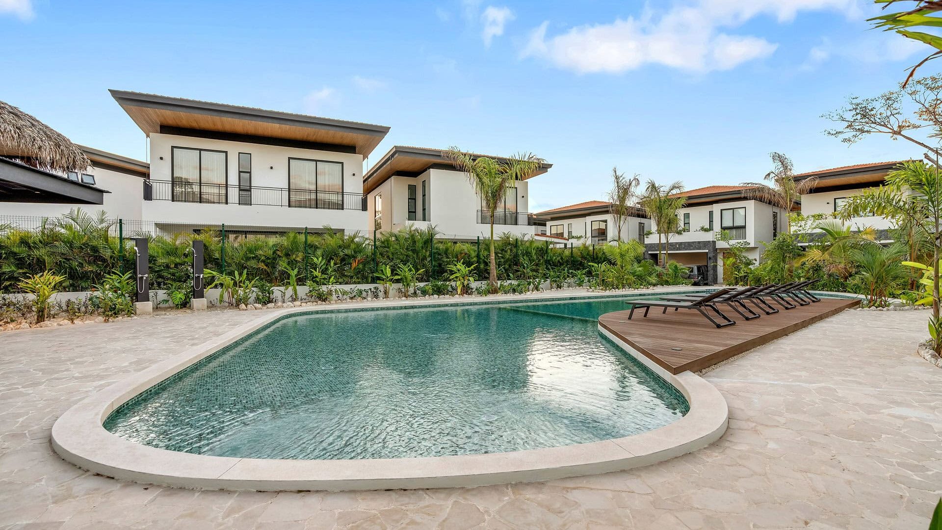 Luxurious modern vacation villa with private pool and tropical garden in Vida Pinilla, Colombia.