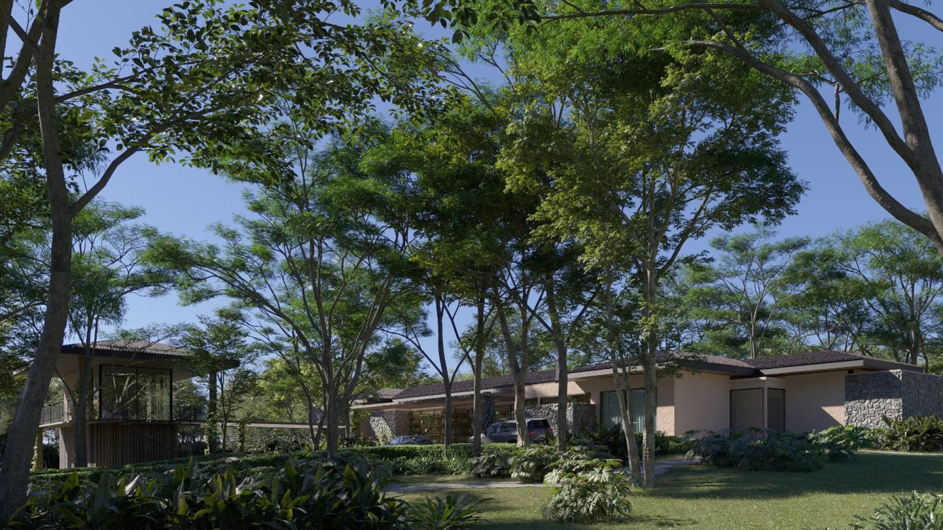 Modern luxury villa nestled among lush green trees in a serene natural setting.