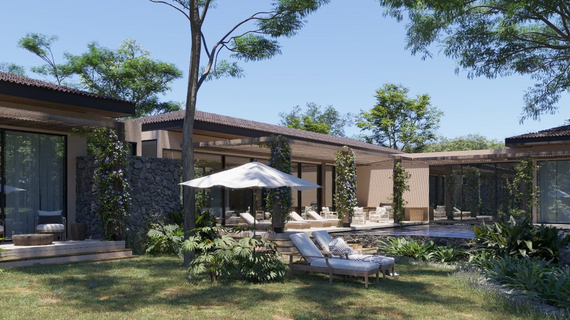 Lush outdoor villa with pool, lounge chairs, and tropical garden, perfect for relaxation and vacation stays.