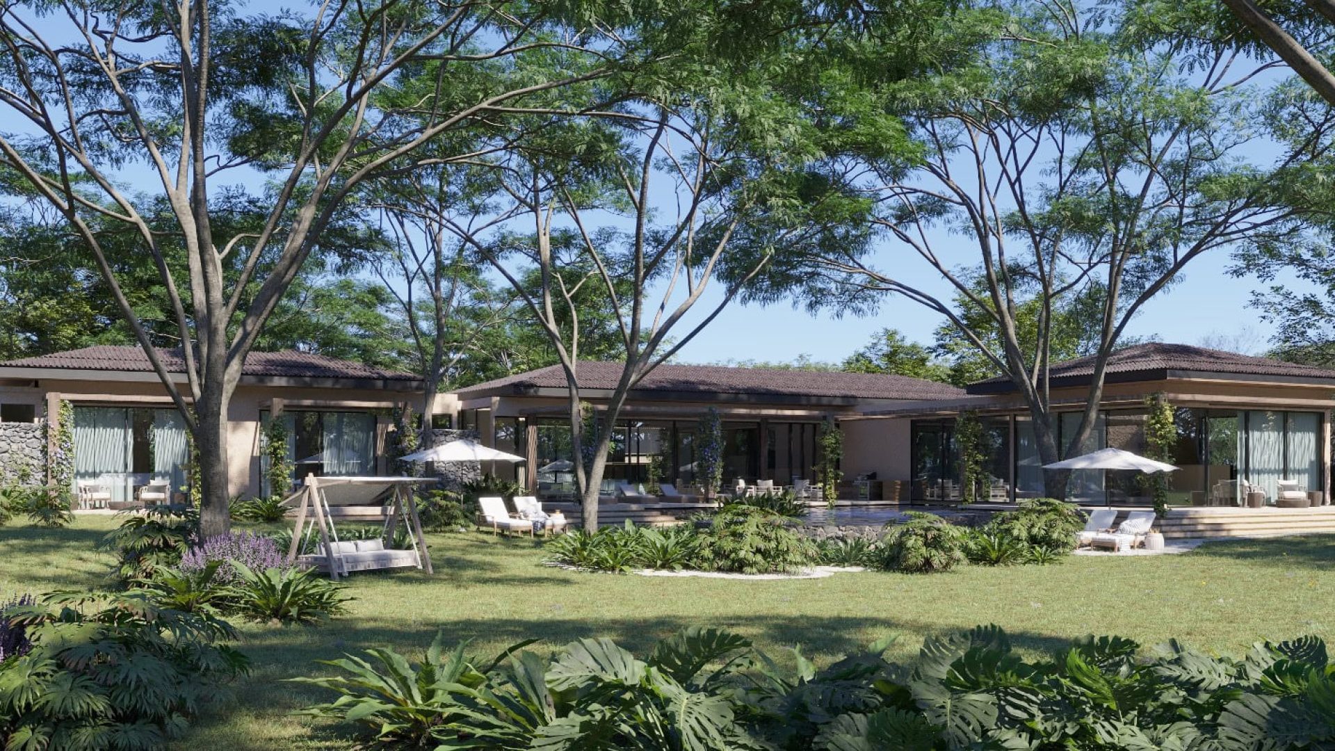 Modern luxury house with spacious outdoor garden and patio, surrounded by trees and nature.