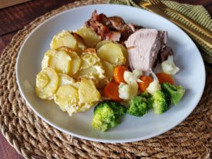 Schweine-Krustenbraten mit Kartoffelgratin