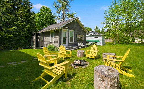 Bemus Point NY shows a cozy home with spots to relax outside, perfect for enjoying time together in a peaceful setting.