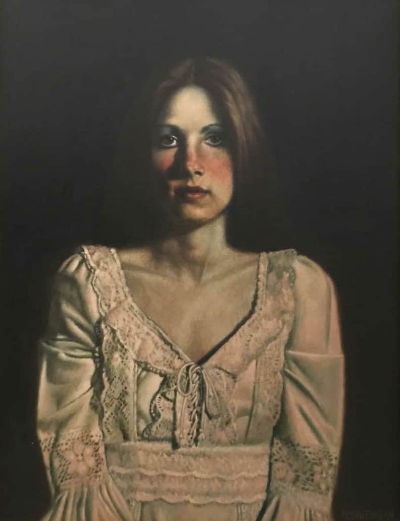 Woman portrait with vintage lace dress, soft lighting, and an artistic, painterly style showcasing fine art and portrait photography.