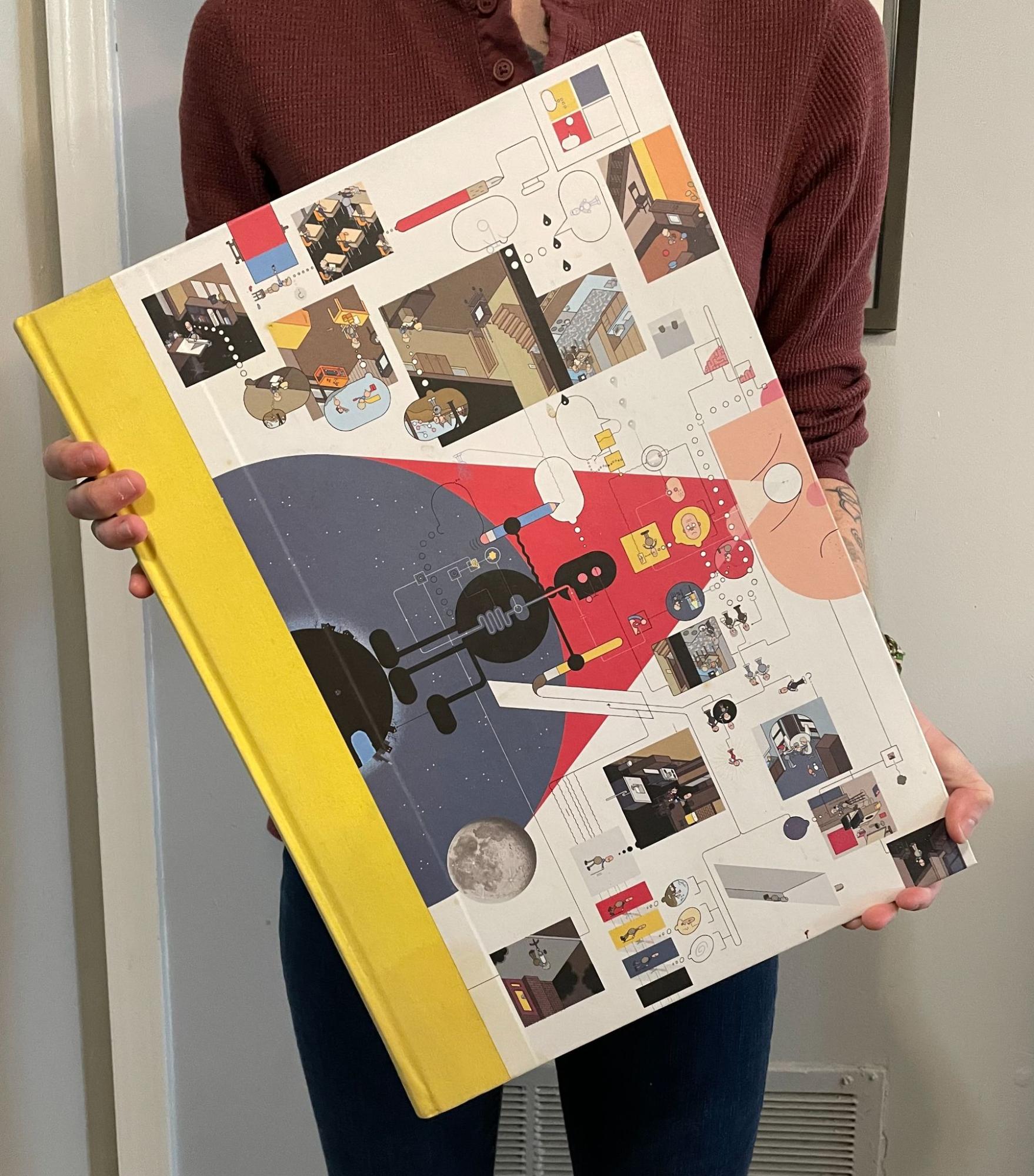 A vibrant illustration on a large book cover showcasing various art installations, digital art, and creative studio spaces, emphasizing contemporary visual arts and artistic innovation.