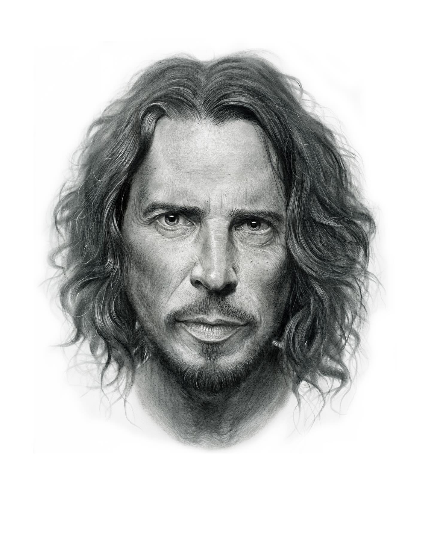 Intricate black and white portrait of a middle-aged man with long, wavy hair, detailed facial features, and expressive eyes, representing fine art and portrait drawing.