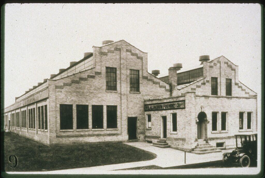 Historical photo of the original Wisconsin Aluminum Foundry brick building.
