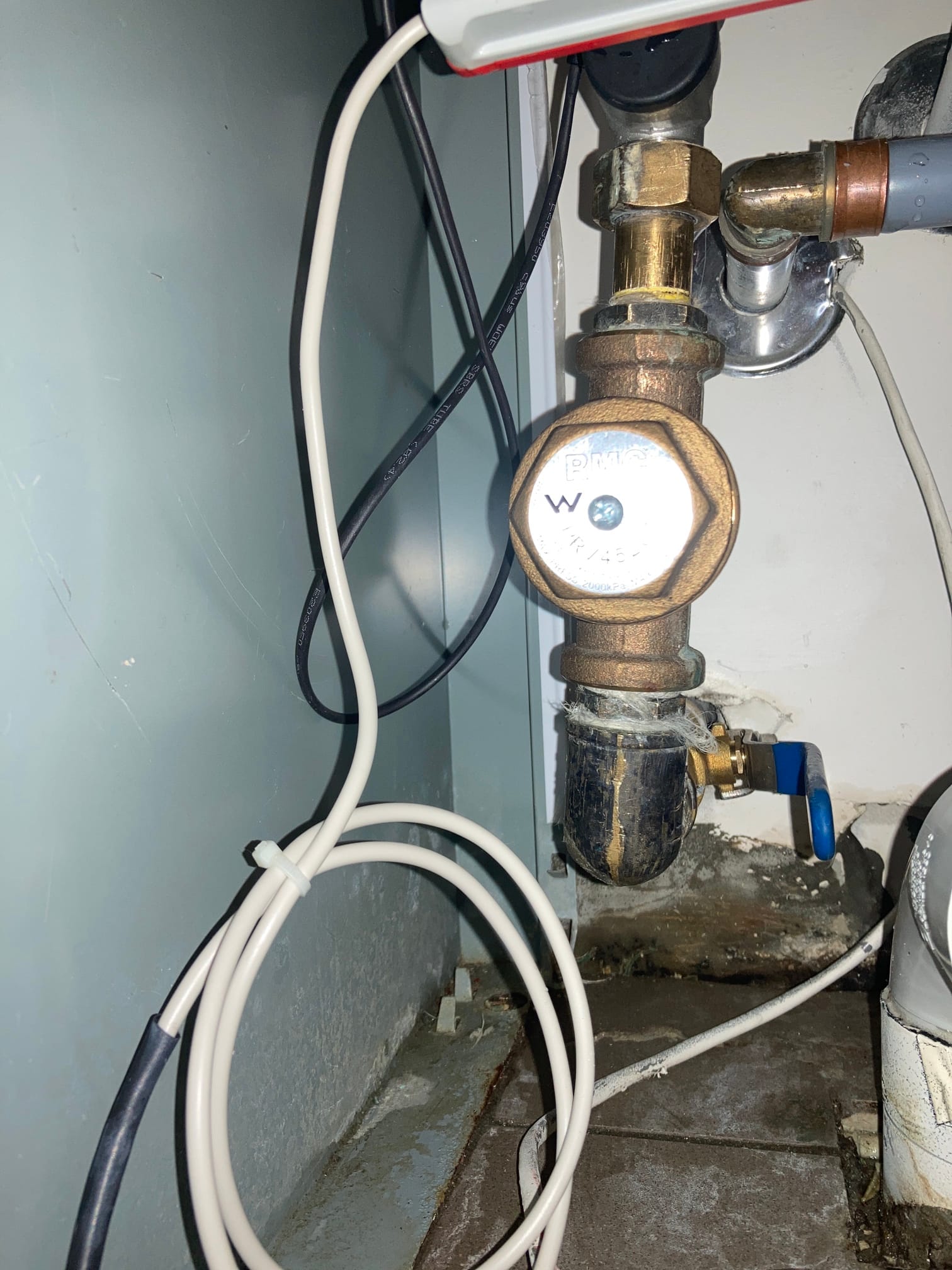 Isolation Tap under a laundry sink