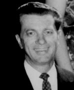 A black and white photo of a man and woman.