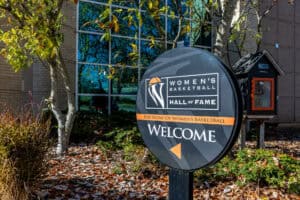 A women's basketball hall of fame sign. A women's basketball hall of fame sign.