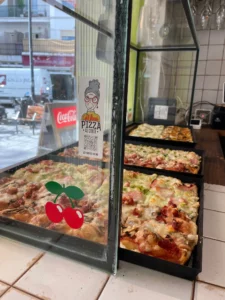 Minú pizza al corte Ibiza