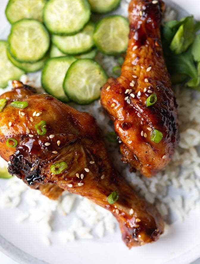 A plate of teriyaki chicken legs