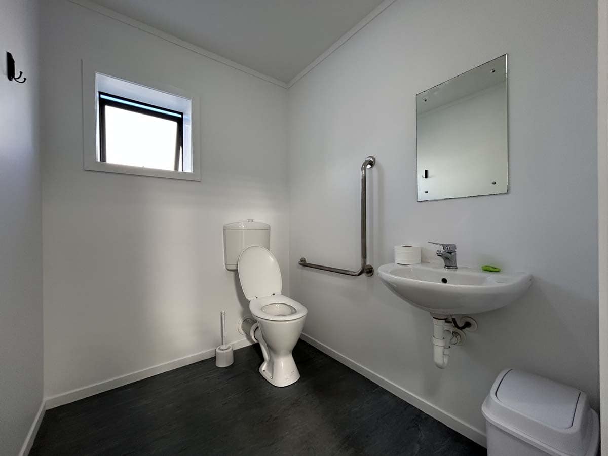 Accessible bathroom with toilet and sink at 107 Corbett Road, White Lion property.