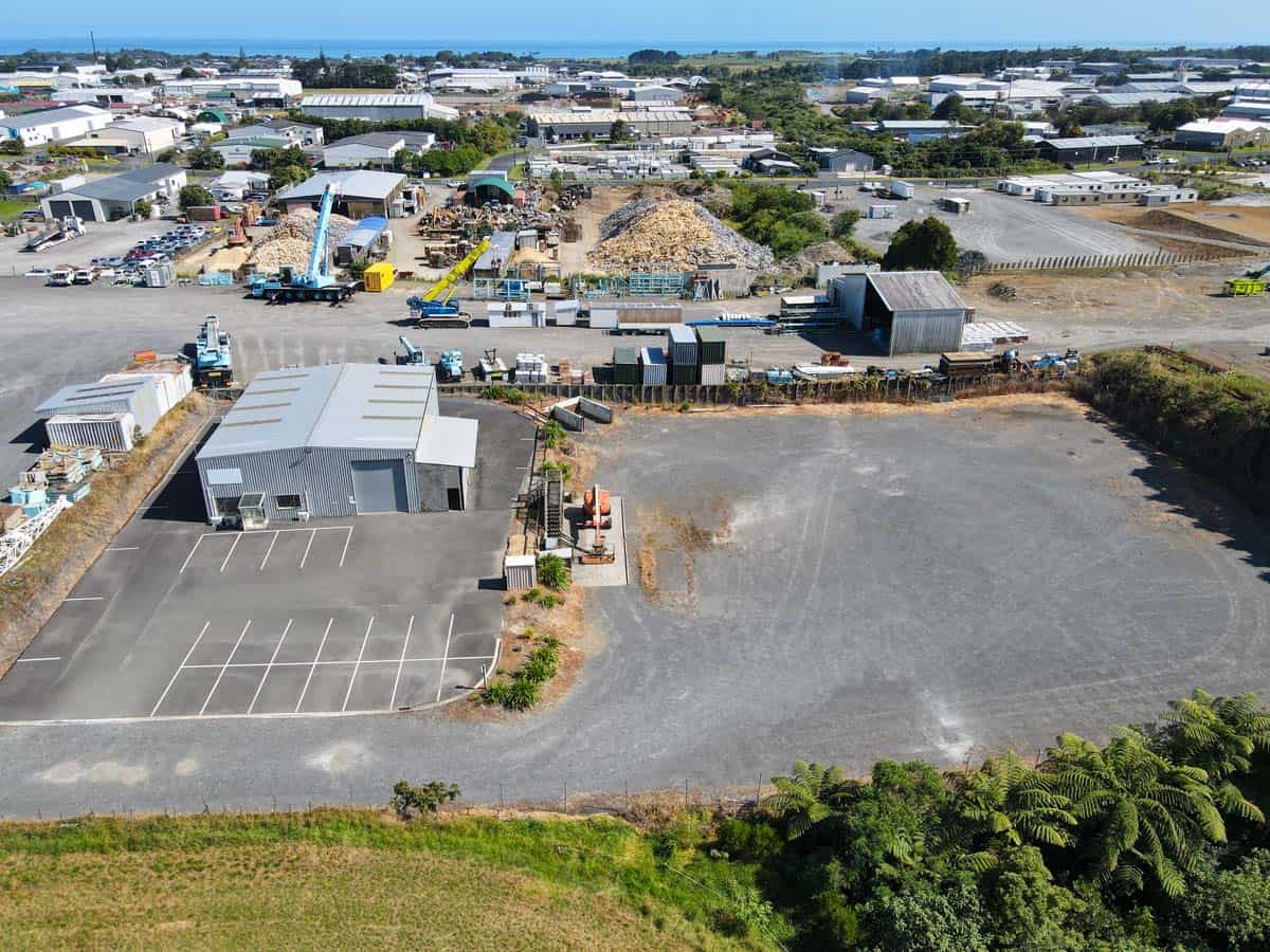 Aerial view of White Lion industrial area with warehouses and construction site.
