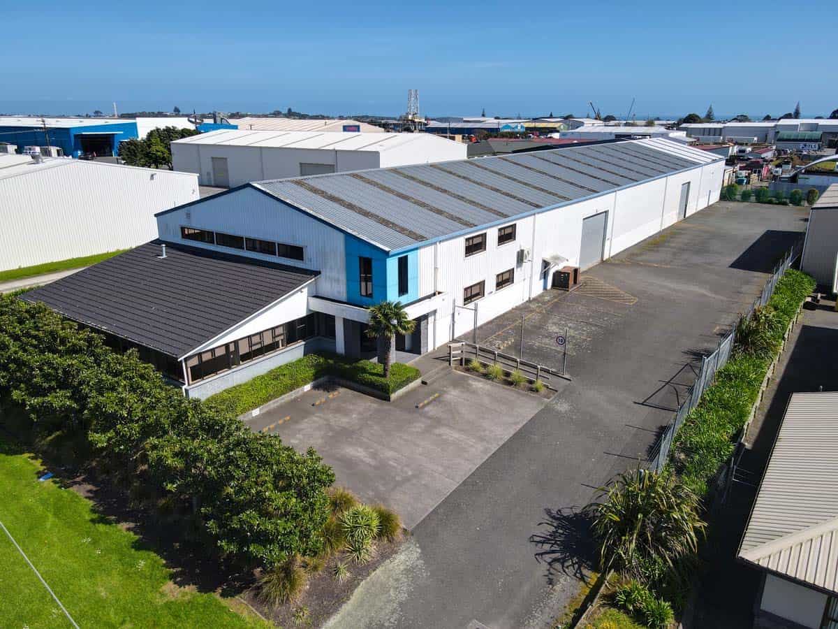 Aerial view of White Lion industrial warehouse located at 107 De Havilland Drive, Auckland, New Zeal.