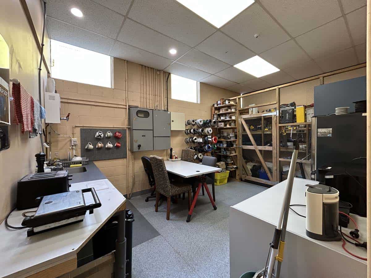 Workshop interior with tools and equipment at 11-13 Lower Tyers Road.