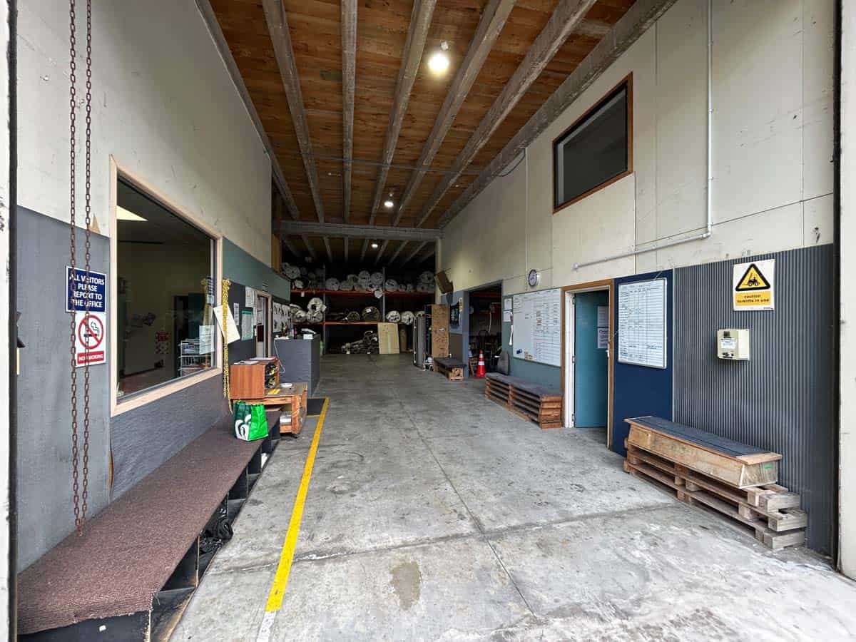 Interior view of White Lion warehouse with storage and loading area.