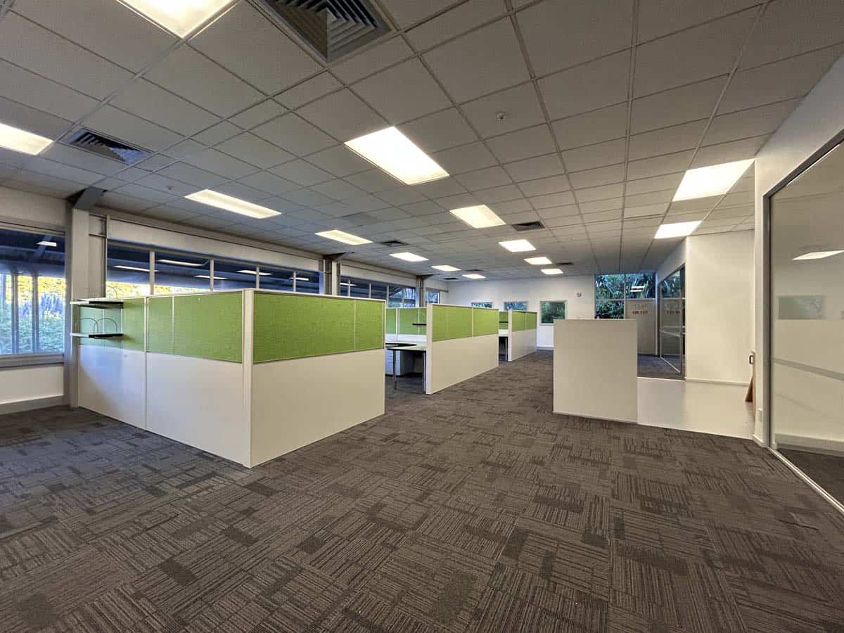 Office workspace with cubicles and natural light at 14 Tyers Road, White Lion.