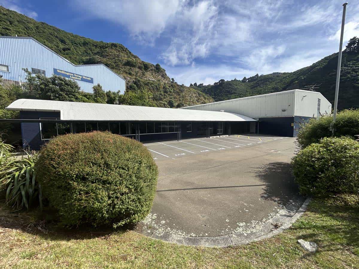 Industrial warehouse and parking area at 14 Tyers Road, surrounded by greenery.