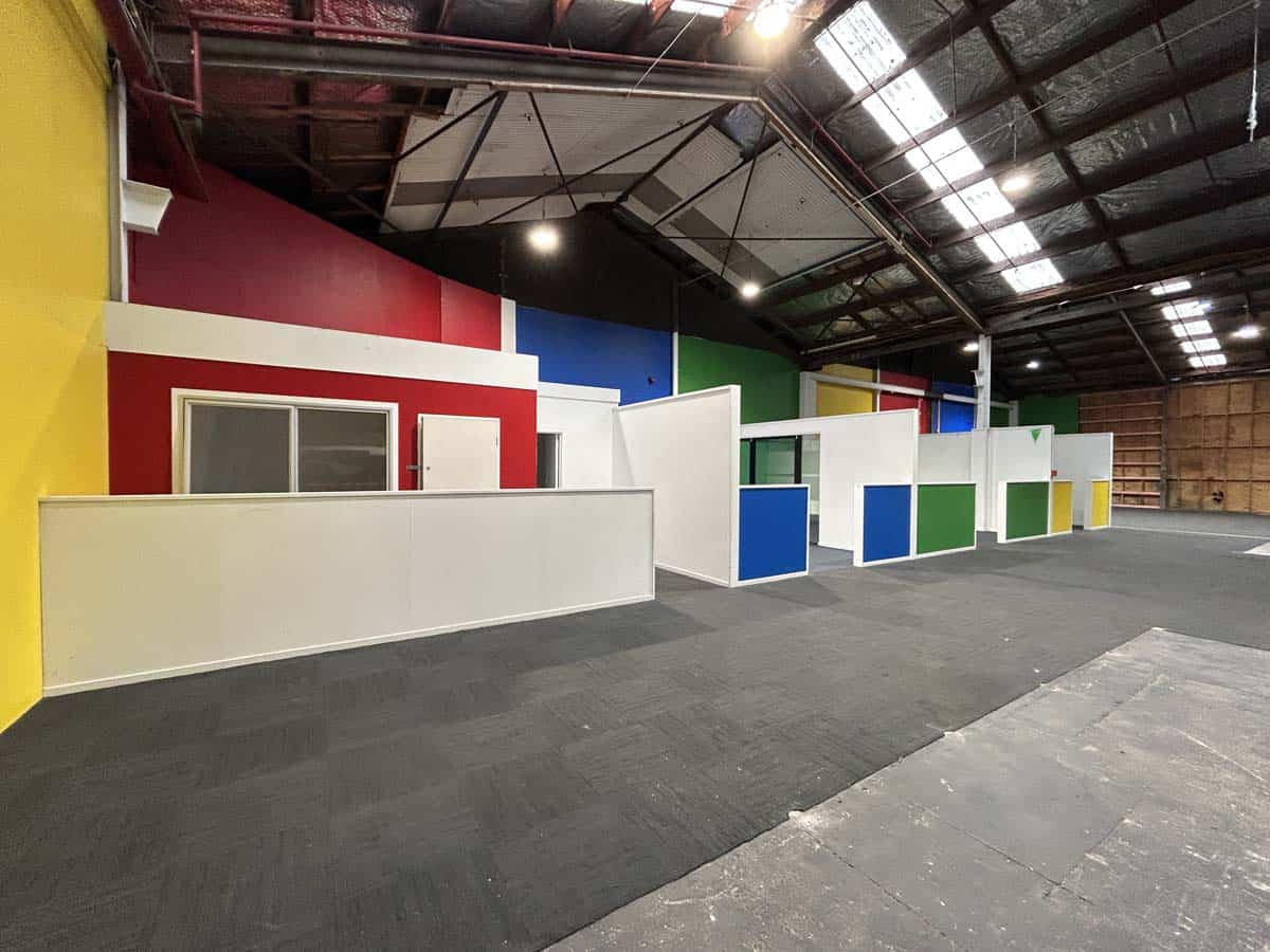 Colorful modern office interior with vibrant walls and open layout.