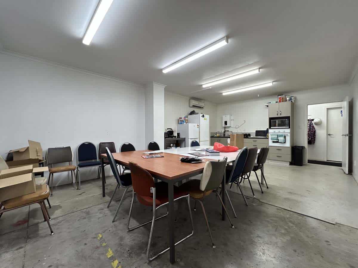 Interior of White Lion meeting room with table and chairs at 211 Connett Road.