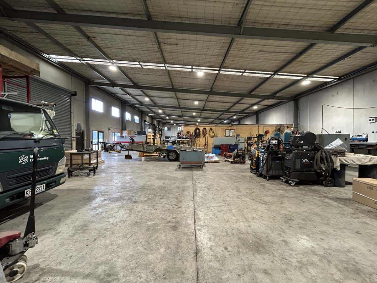 Spacious industrial workshop with machinery and equipment at 211 Connett Road.