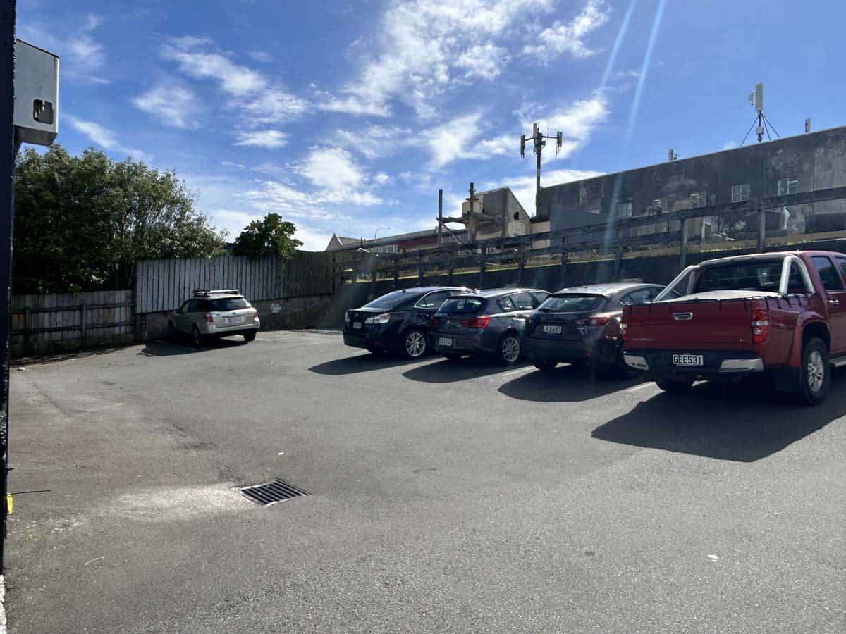 Parking lot with multiple vehicles at 31 Johnsonville Road, Wellington.
