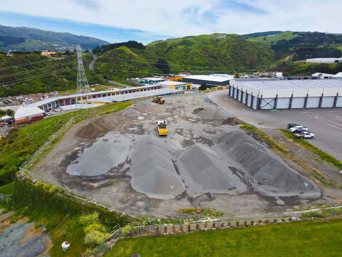 Construction site with gravel piles near 42 Jamaica Drive, New Zealand.