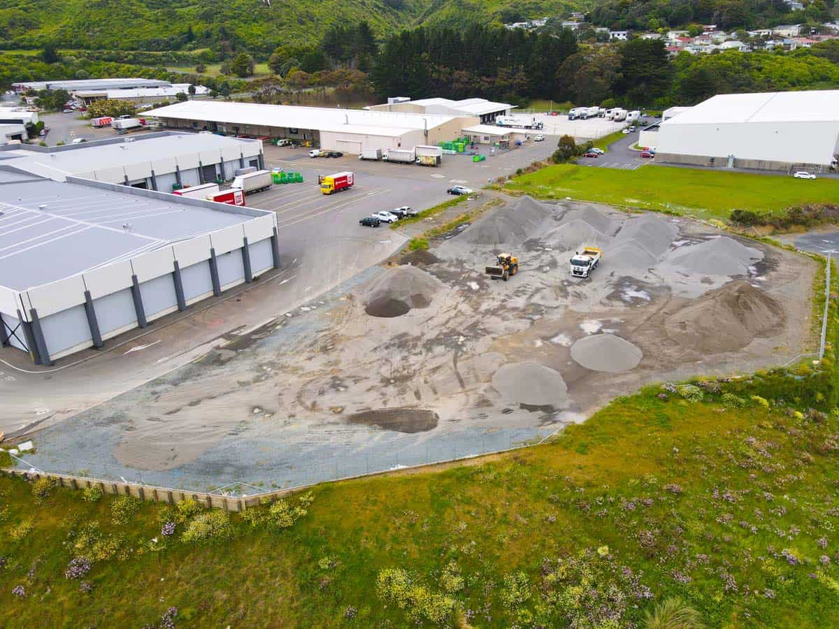 Construction site with machinery and gravel at 42 Jamaica Drive, White Lion project.