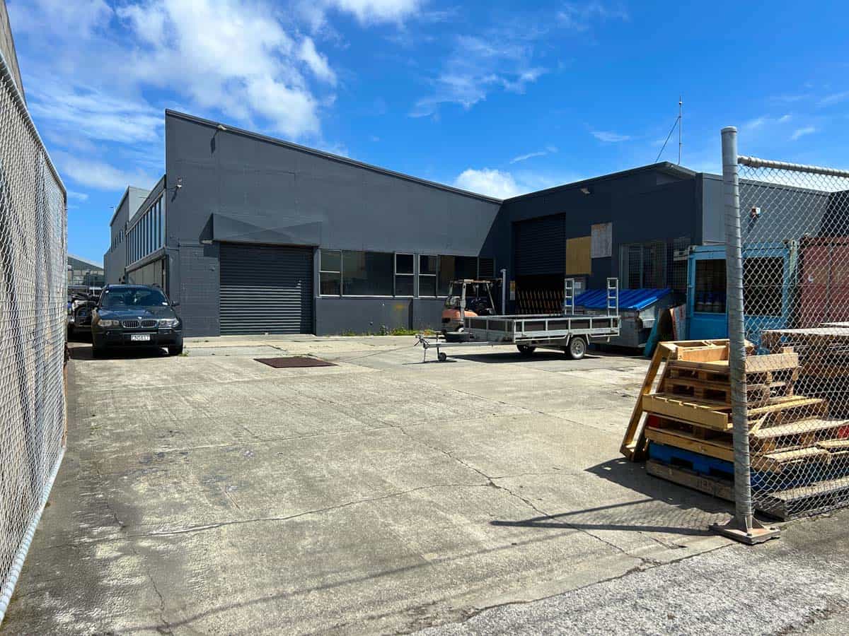 Modern industrial building at 45 Waione Street with parking and fencing.