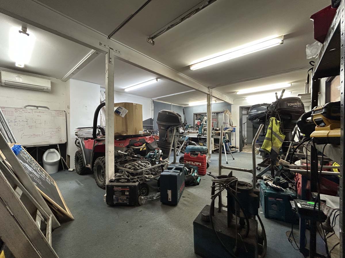 Workshop with tools and equipment at 47A Victoria Street, White Lion building.