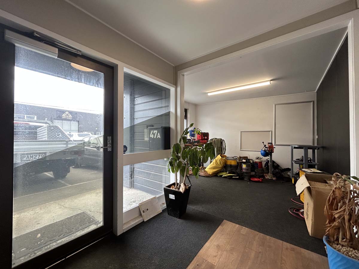 Modern office space at 47A Victoria Street with natural light and workspace setup.