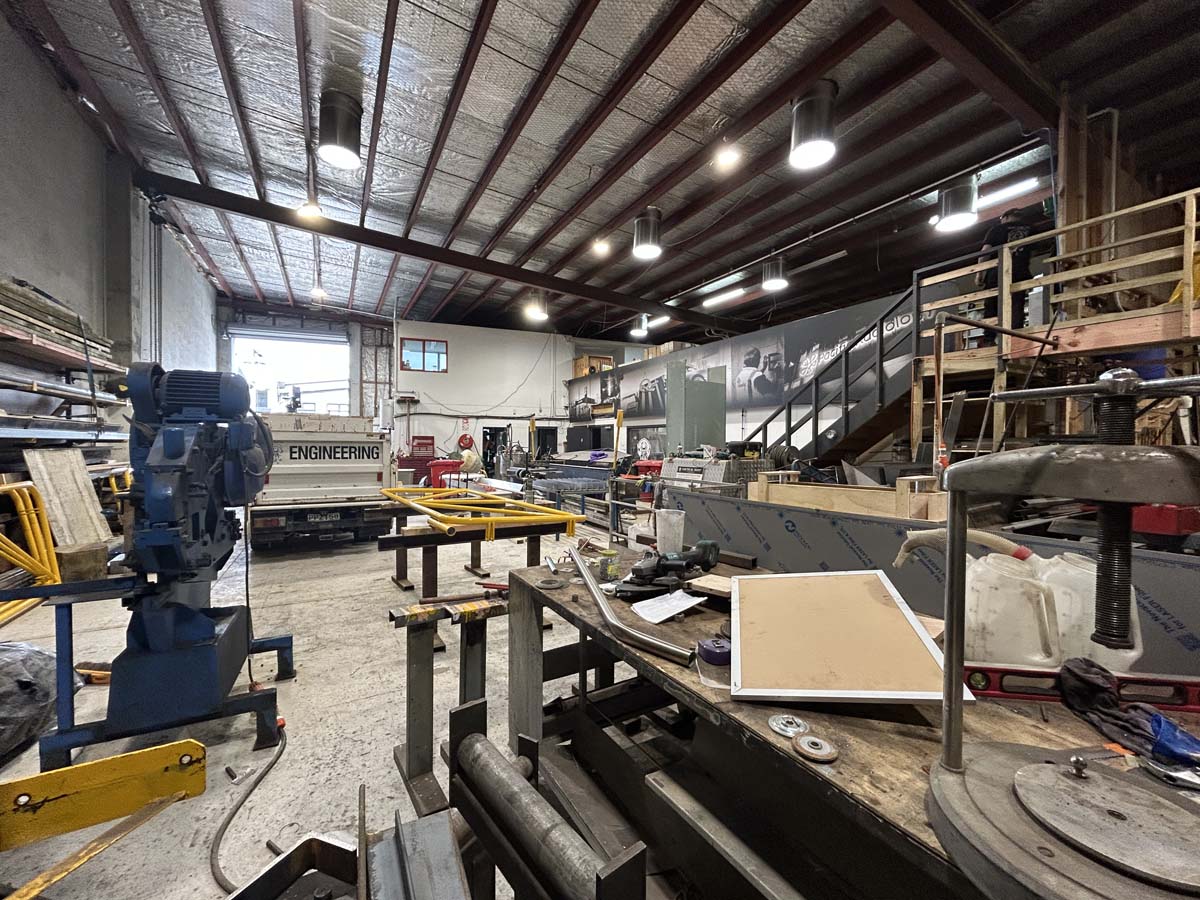 Industrial workshop with machinery and workbenches at White Lion, 47A Victoria Street.