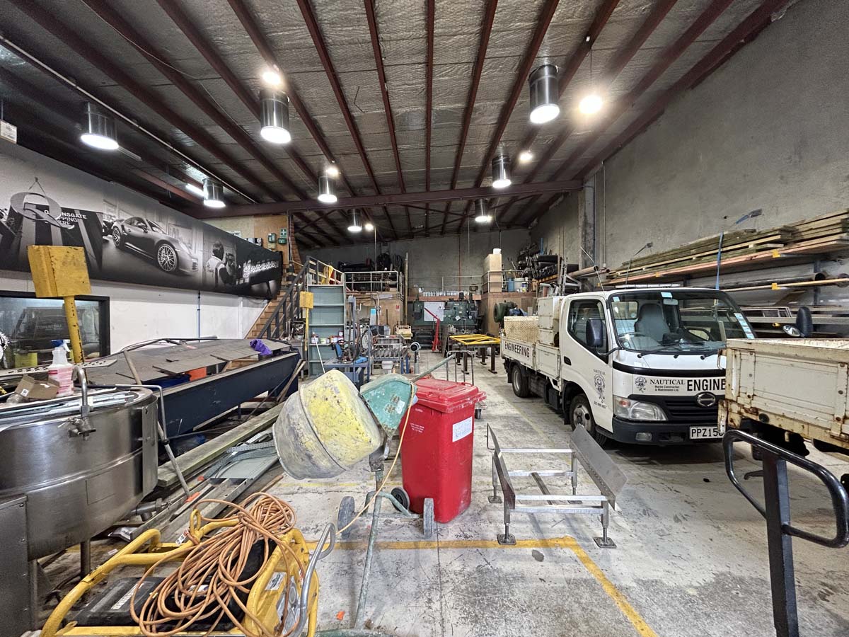 Workshop interior of White Lion at 47A Victoria Street with tools and equipment.