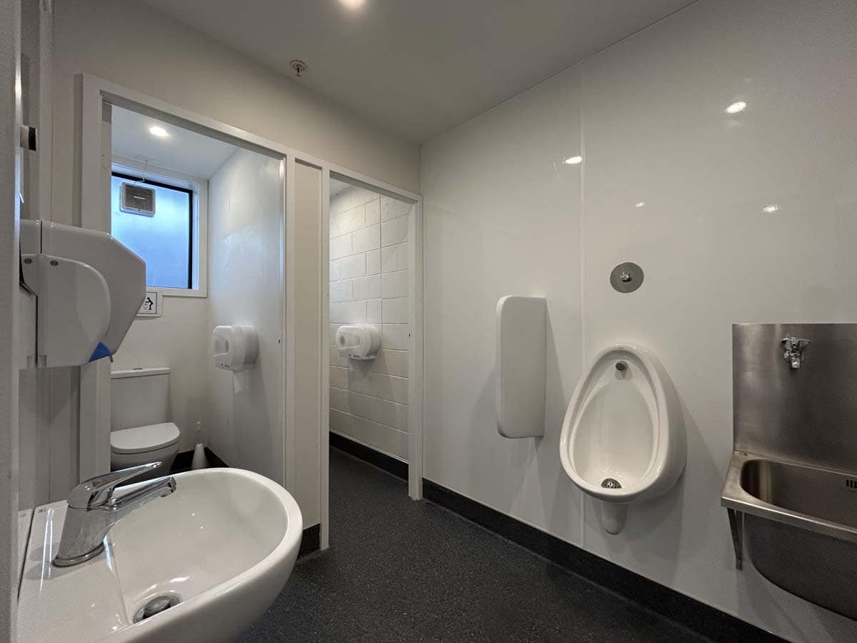 Public restroom facilities at 69 Waione Street, featuring modern amenities and clean design.