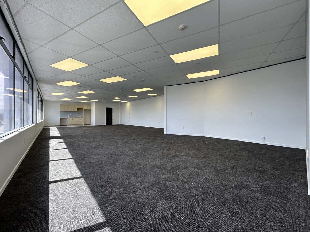 Spacious interior of White Lion commercial office at 77 Port Road with large windows and modern ceil.