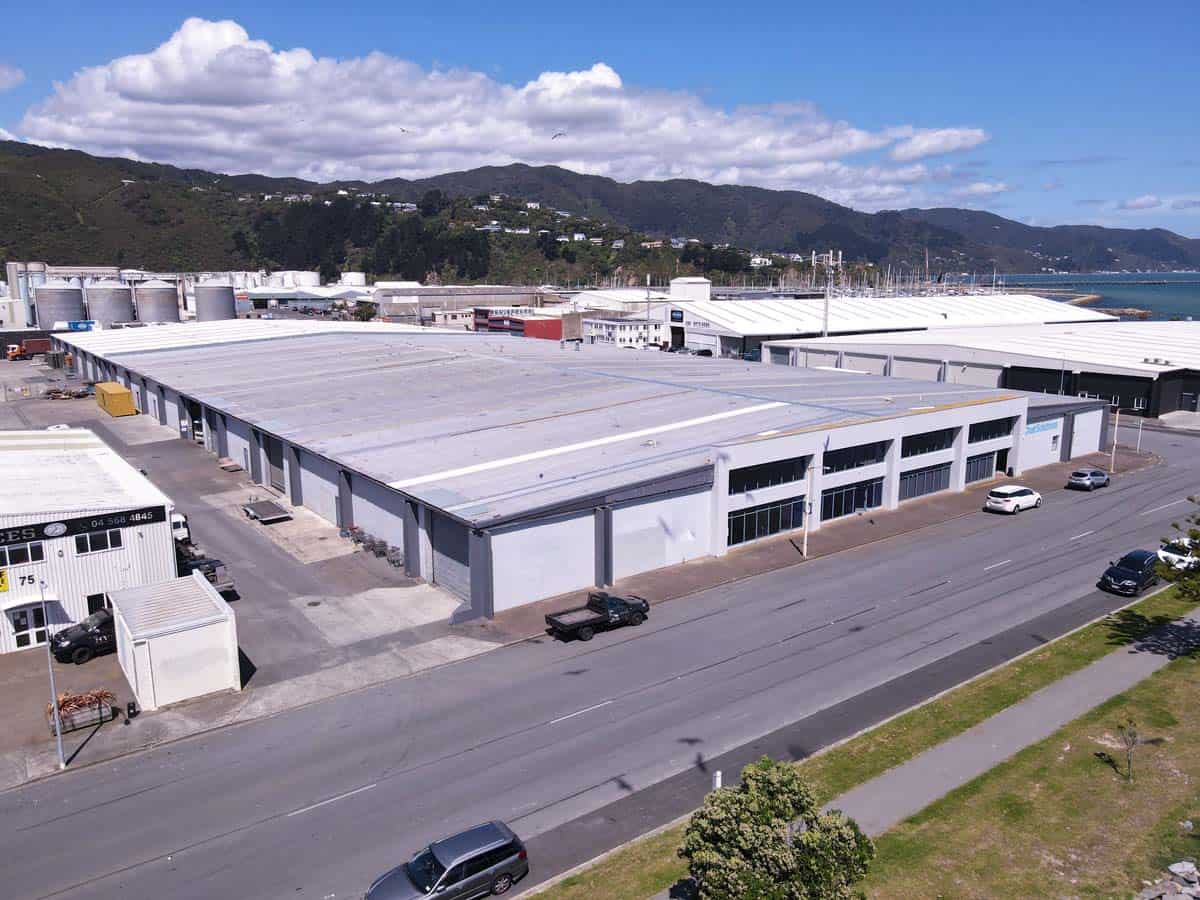 Aerial view of White Lion industrial warehouse located at 77 Port Road, with surrounding vehicles an.
