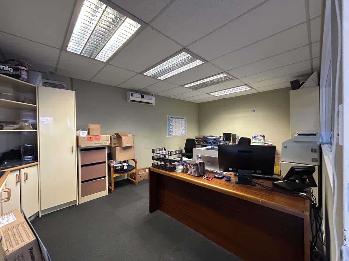 Interior view of a professional office space with desks and storage at 86 Gill Street.