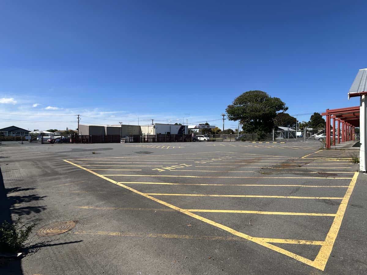Empty parking lot at 1121 Devon Road, White Lion premises.