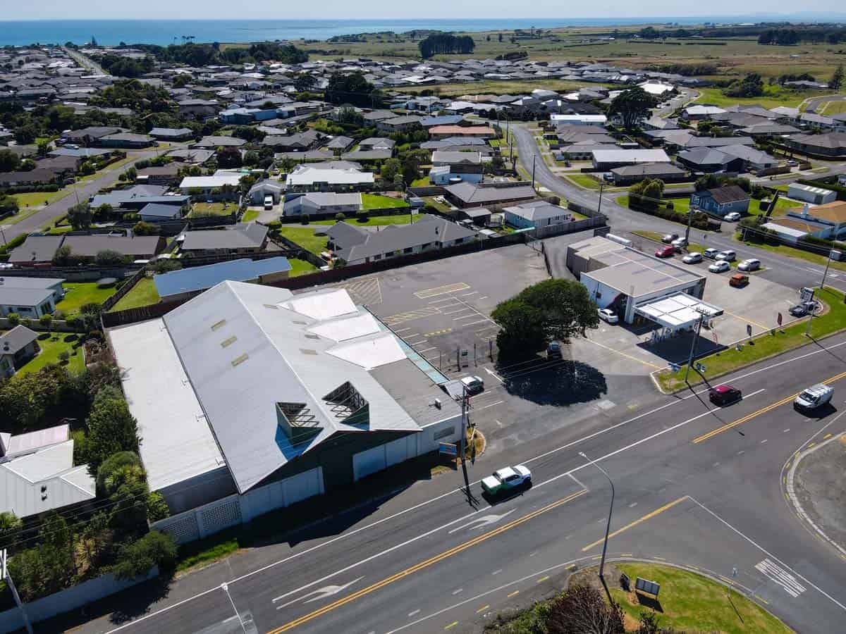 Aerial view of White Lion building at 1121 Devon Road, surrounded by residential area.