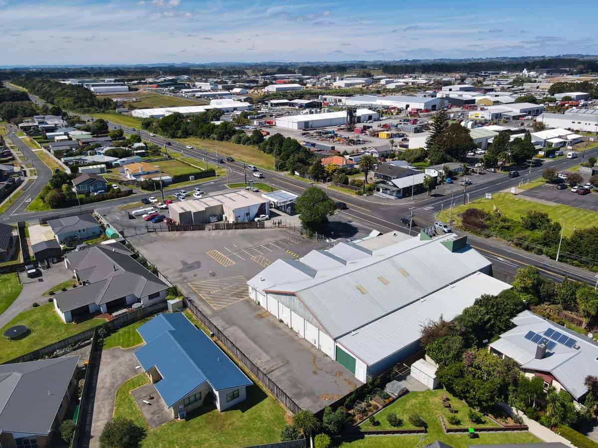 Aerial view of White Lion industrial warehouse and surrounding commercial area in Devon Road, New Ze.