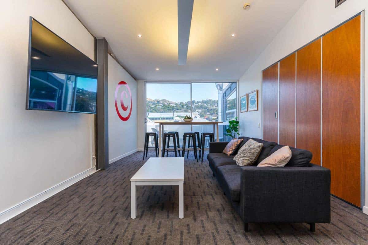 Bright, contemporary living space with large windows and stylish decor.