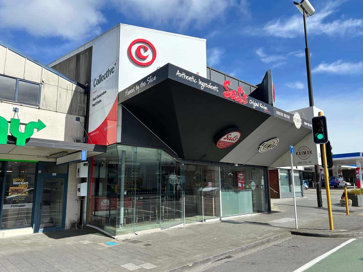 Modern commercial building with signage at 20 Johnsonville Road, Wellington.