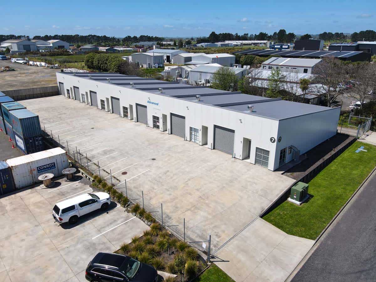 Aerial view of White Lion industrial warehouse with multiple loading bays and parking area.