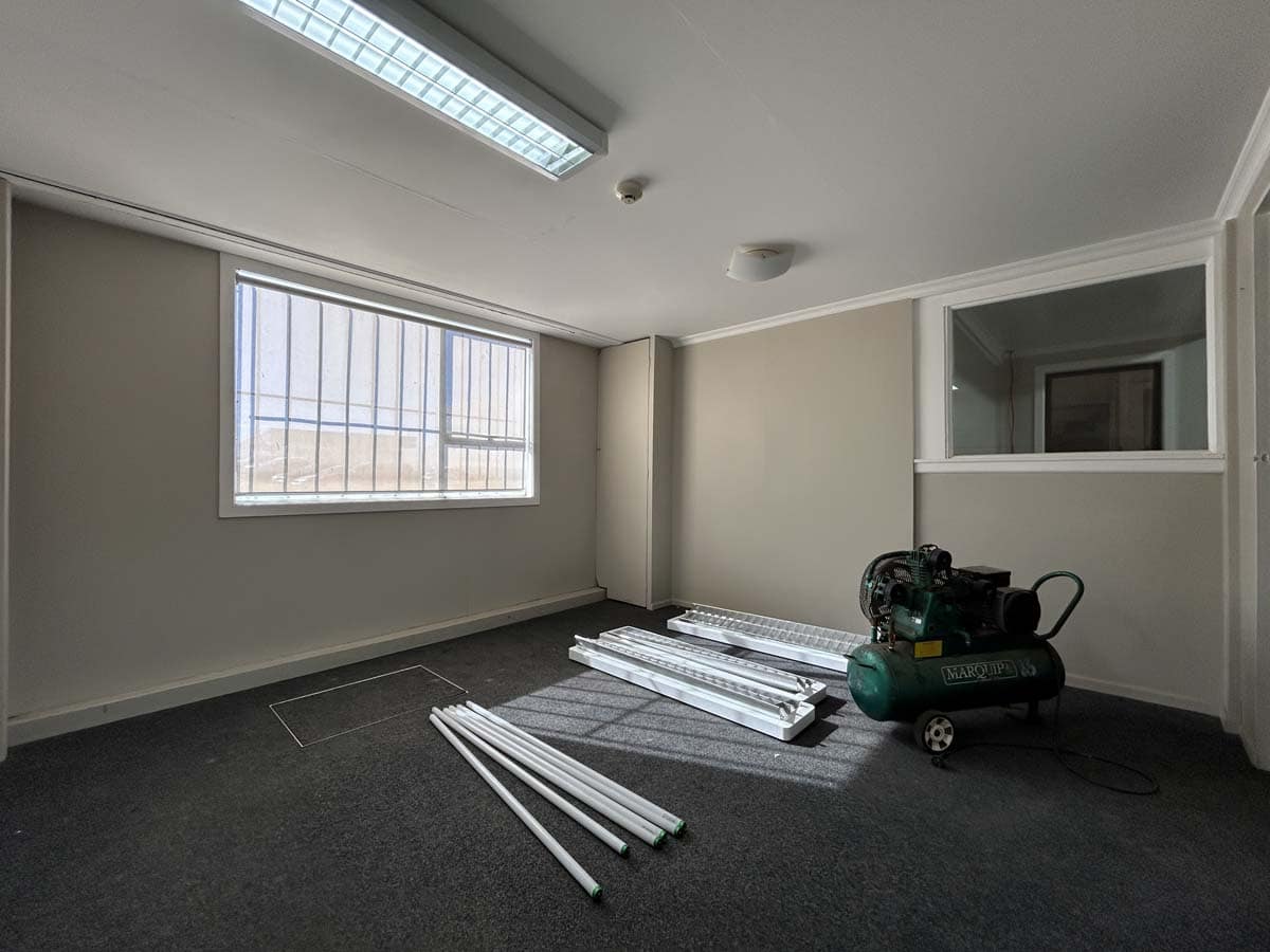 Interior of White Lion office with lighting fixtures and equipment at 100 Gill Street.