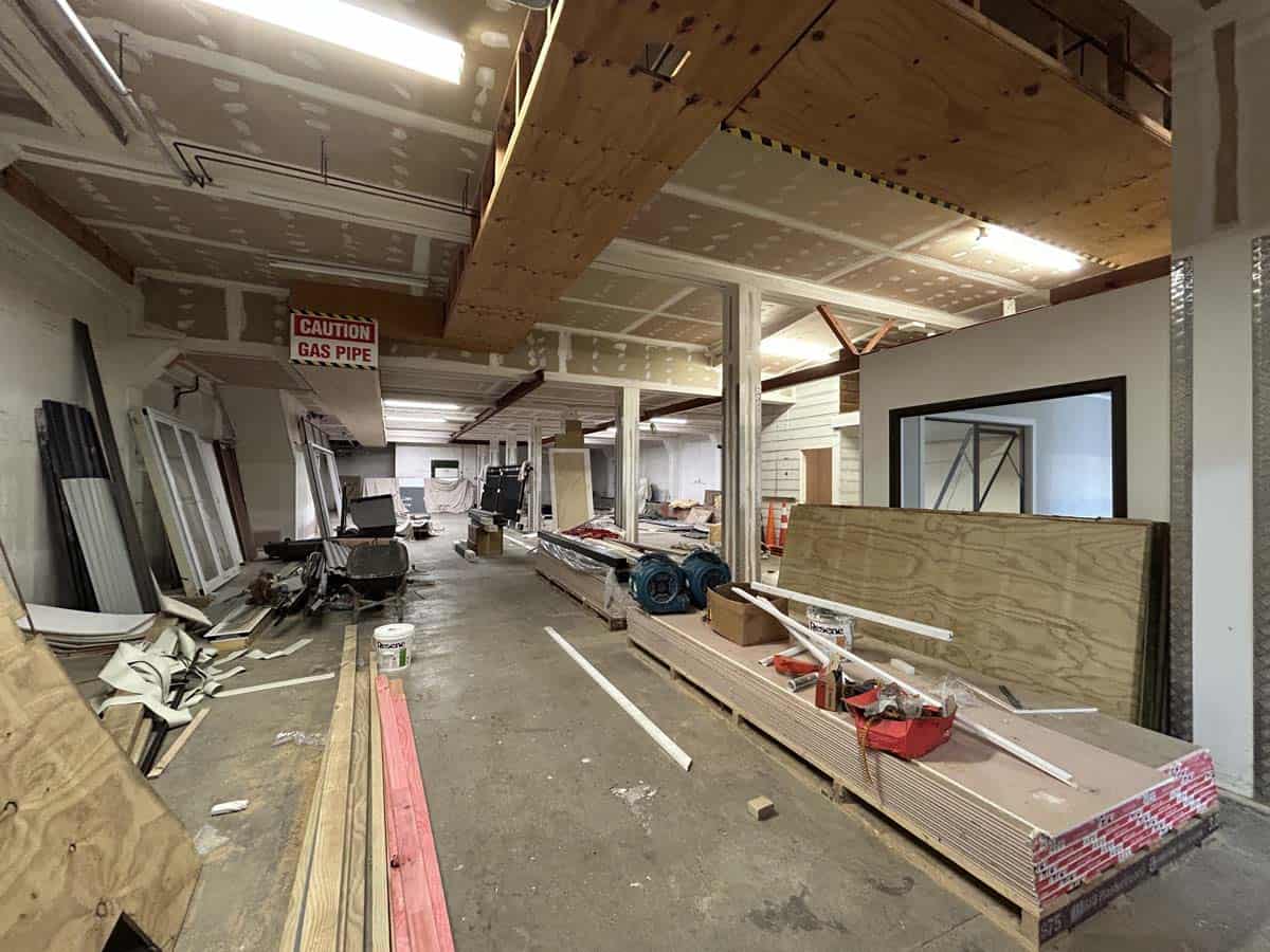 Interior view of White Lion office renovation at 100 Gill Street, showing construction materials and.