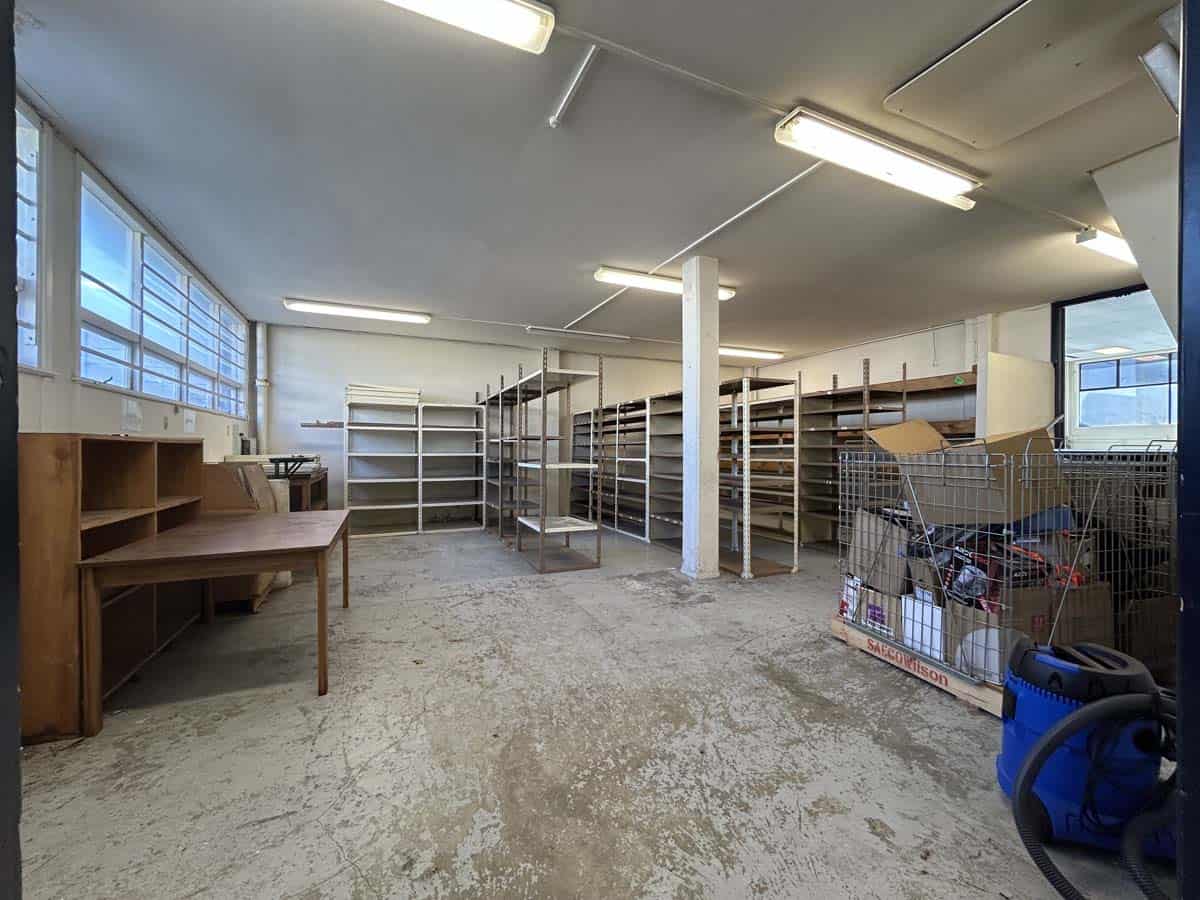 Interior view of White Lion store shelving and storage area.