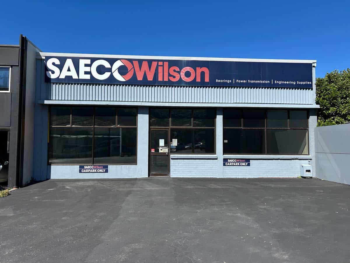 SAECOWilson industrial building at 122 Hutt Road with signage and large windows.