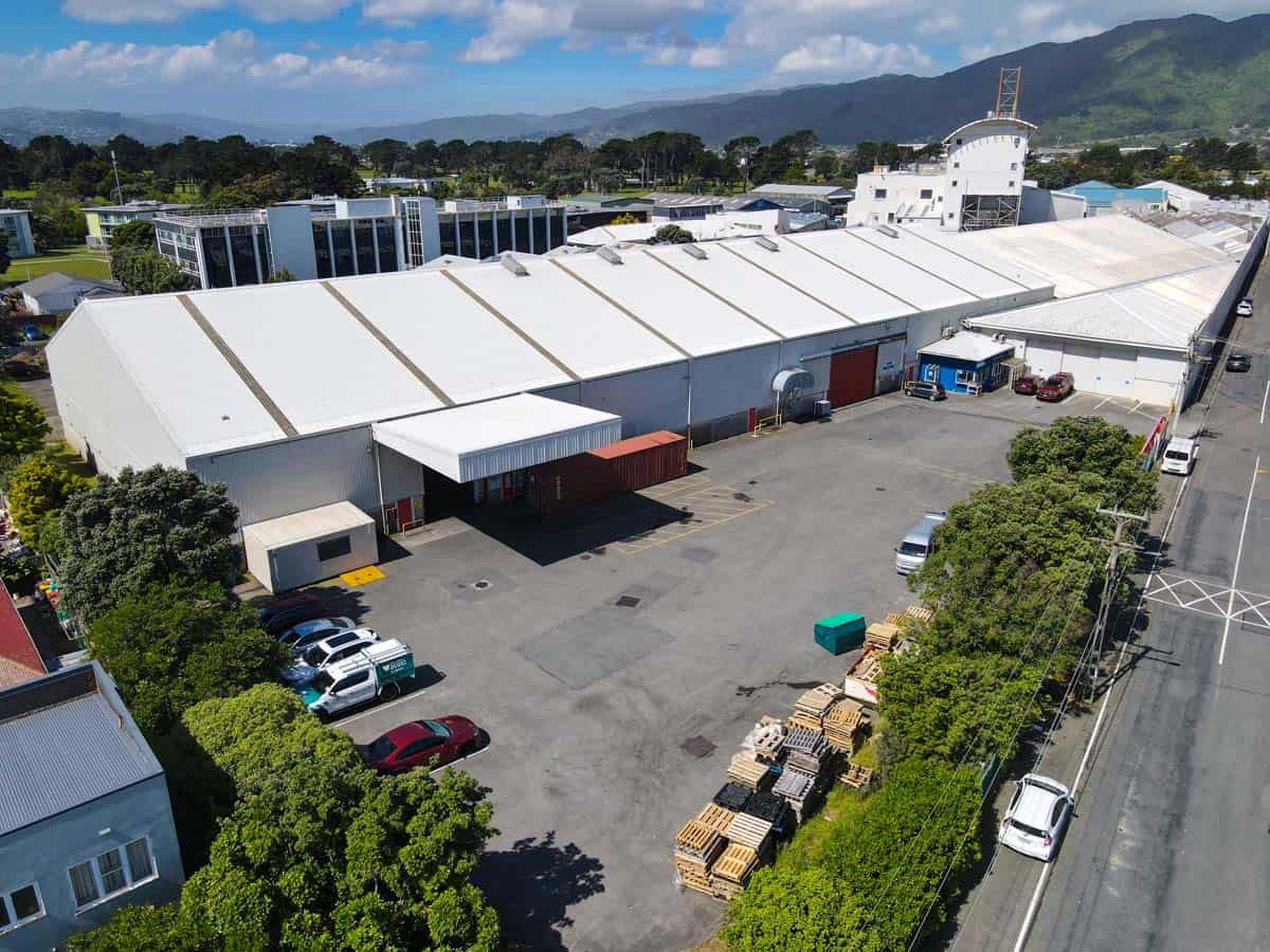 Aerial view of White Lion industrial warehouse at 38 East Street, with parking and surrounding green.