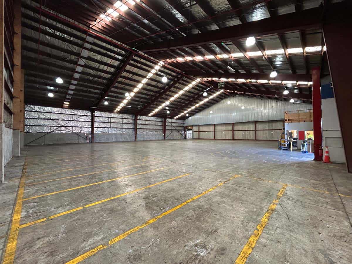 Indoor warehouse space with high ceilings and ample storage at 38 East Street.